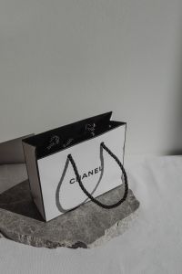 Kaboompics - Chanel Shopping Bag on Stone Slab
