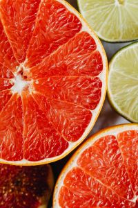 Kaboompics - Grapefruit and Lime Close-Up on Linen for Fresh Beverage Recipes