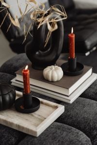 Kaboompics - Halloween Candle Display on Dark Armchair