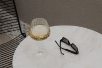 Kaboompics - White Wine and Sunglasses on Marble Table