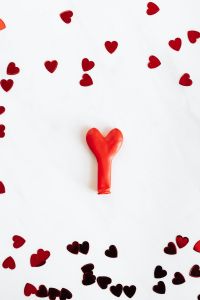 Kaboompics - Confetti and Balloon on White Background