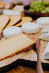 Cheese, white wine and grapes