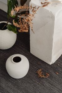 Kaboompics - Close-Up White Ceramic Vase with Textured Neutral Decor