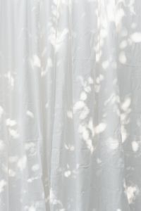 Kaboompics - Minimal White Curtain Texture with Dappled Light