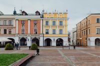 Kaboompics - Pastel Buildings and Arcades in Zamość Square