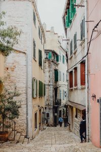 Kaboompics - Steep Cobblestone Street with Colorful Shuttered Houses in Rovinj