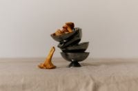 Kaboompics - Chanterelle Mushrooms in Sculptural Metal Bowls