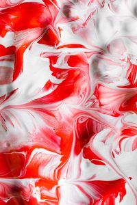 Abstract Red Paint Flow across White for Creative Design Backgrounds