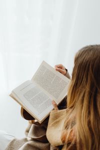 Kaboompics - Overhead View of Woman Reading a Book