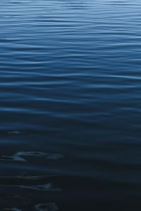 Kaboompics - Soft Blue Water Surface with Fine Horizontal Ripples, Calm Background for Text Overlay