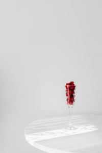 Kaboompics - Raspberries In Champagne Flute On Marble Table