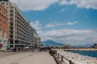 Kaboompics - Naples Seafront Walkway With Waterfront Buildings and Distant Vesuvius