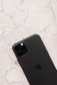 Kaboompics - Diagonal Close-Up of Apple iPhone 11 Pro on Pink Marble