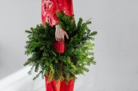 Kaboompics - Close-Up Evergreen Wreath and Red Sequin Outfit
