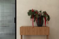 Kaboompics - Wide Holiday Styling with Pine Arrangement, Red Ribbons and Ribbed Glass Door