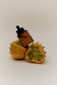 Kaboompics - Natural Skincare Oil With Exotic Fruit – Fresh Kiwano Backdrop