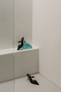 Kaboompics - Black Pointed Heel with Turquoise Fabric in Minimal Interior