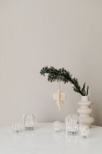 Kaboompics - Neutral Holiday Display With Hanging Paper Ornament