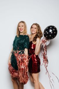 Kaboompics - Women Looking Up at Balloons and Party Streamers
