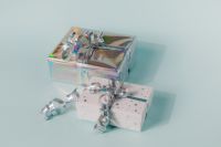 Kaboompics - Holographic Gift Box and White Star Print Present