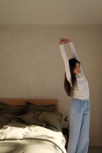 Kaboompics - Bare Feet Stepping onto a Bedroom Rug in the Morning