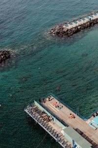 Kaboompics - Sunbathers On A Seaside Platform In Sorrento, Italy