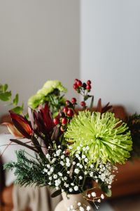 Kaboompics - Close Up of Festive Christmas Bouquet in Neutral Vase