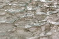 Kaboompics - Low-Angle View Across Repeating Textured Glass Facets