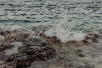 Kaboompics - Sea Wave Splash Breaking Against Dark Coastal Rocks