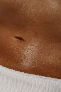Kaboompics - Macro Sunlit Skin Texture with White Bikini Edge