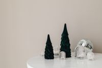 Kaboompics - Green Christmas Trees With Disco Ball and Glass Ornaments