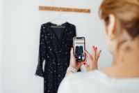 Kaboompics - Over-the-Shoulder Product Photo of a Navy Dress in a Bright Home Studio