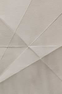 Kaboompics - Folded White Paper with Geometric Seams