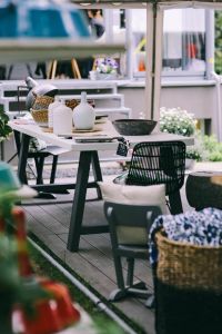 Kaboompics - Garden table with jars, bowls and baskets