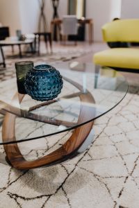 Kaboompics - Blue Glass Vase on Round Coffee Table in Contemporary Living Room