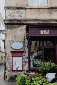 Kaboompics - Cafe Window and Weathered Facade in Krakow