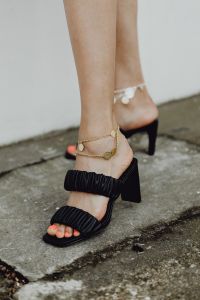 Kaboompics - Black Ruched Mules with Gold Charm Anklet