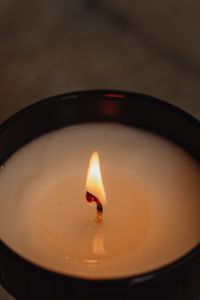 Kaboompics - Close-Up of Candle Flame in a Black Jar