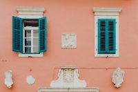 Kaboompics - Pastel Pink Facade with Turquoise Shutters and Decorative Stonework, Rovinj