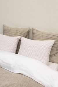 Kaboompics - Close-Up Checkered Bedding and Neutral Pillows