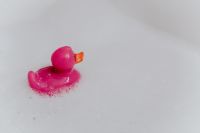 Kaboompics - Pink rubber ducky in foam