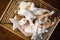 Kaboompics - White Christmas Decorations in a Wire Basket