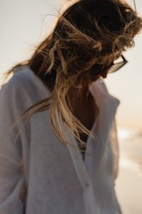 Kaboompics - Windblown Blonde Hair Portrait with White Shirt and Sunglasses