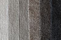 Kaboompics - Striped Neutral Bouclé Upholstery Fabric Samples