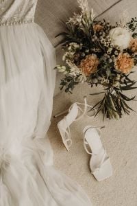 Kaboompics - Bridal Dress, White Heels and Bouquet in a Flat Lay