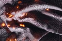 Kaboompics - Folded Burgundy Patterned Textile with Amber Light Bokeh