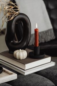 Kaboompics - Black Candle White Pumpkin and Books