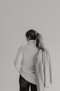 Kaboompics - Black and White Rear View of Faceless Woman with Beige Coat