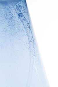 Kaboompics - Blue Soap Bubble Foam Macro Texture with Abstract Water Patterns and White Copy Space