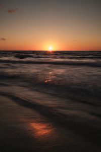Kaboompics - Sunset Over Dark Waves with Sea Reflection